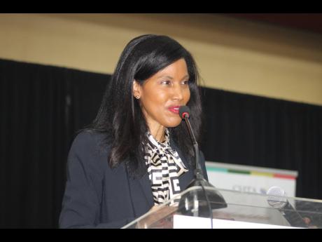 Nicola Madden-Grieg, president of the Caribbean Hotel and Tourism Association (CHTA), addressing the CHTA ‘Travel Forum’ 2024 on Monday, May 20 at the Montego Bay Conference Centre in St James.
