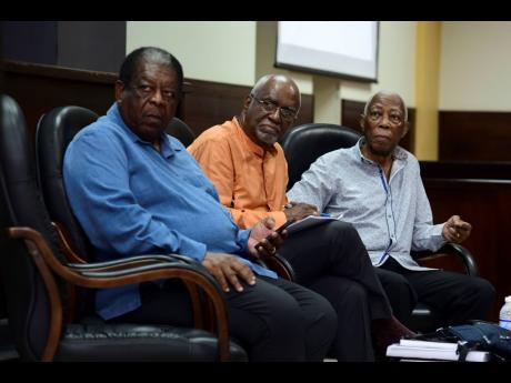 
From left: Sir Dennis Byron, former president of the Caribbean Court of Justice; Patrick Lipton Robinson, former judge of the International Court of Justice; and AJ Nicholson, author and former attorney general of Jamaica, during the launch of the book, T