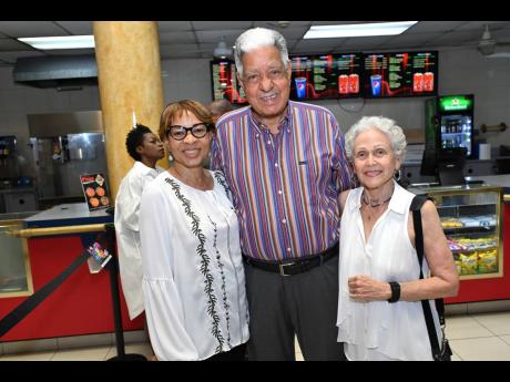 From left: Coleen Brown Jackson, chief executive officer, Virgen Advertising Limited and Palace Amusement directors Douglas Graham and Melanie Graham. 