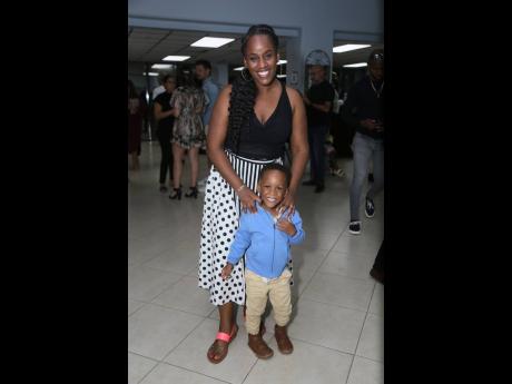Melecia Bromley and her son, little Marley Bromley, anxiously await the beginning of the show.