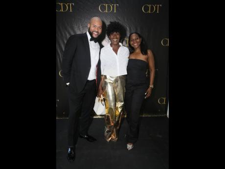 Barbara McDaniel, founding member of The Company Dance Theatre and artistic director of Dance Theatre Xaymaca, is in good company, flanked by attorney-at-law Colin Blackwood (left), executive director of the CDT, and Cheryl Lawson Waite, founding member of