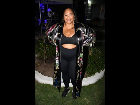 Karla Jankee, head of marketing and special events at Downsound Entertainment/Reggae Sumfest, adds some colour to her black athleisure wear with a kimono cover-up.