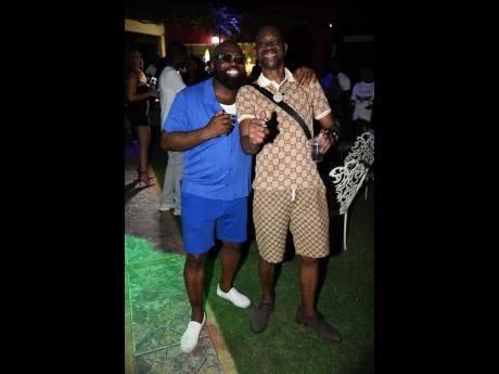 The man of the moment, dancehall heavyweight Bounty Killer (right), poses with friend and long-time musical collaborator, Richie Stephens. 