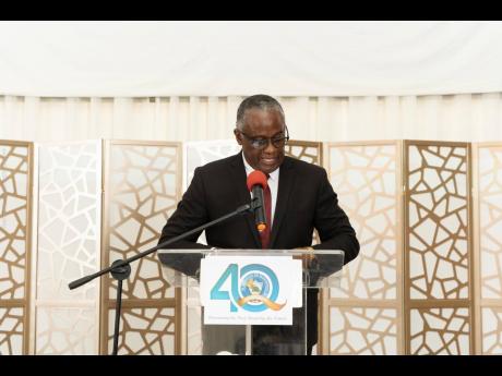 Custos Rotolorum for Manchester, Garfield Green, during his remarks at the El Instituto de Mandevilla 40th Anniversary Homecoming and Awards Banquet, held at the Golf View Hotel in Mandeville.  