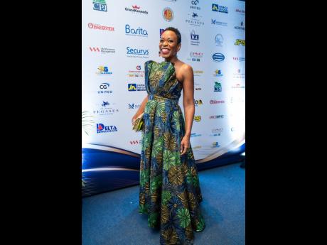 Rochelle Cameron, founder of Prescient Consulting Services Ltd, dazzled in a stunning off the shoulder printed gown.