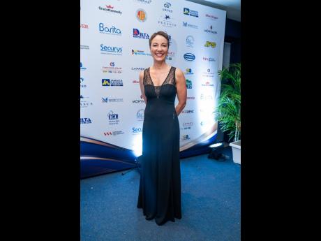 Minister of Foreign Affairs and Foreign Trade Kamina Johnson Smith, radiated elegance in her black gown.