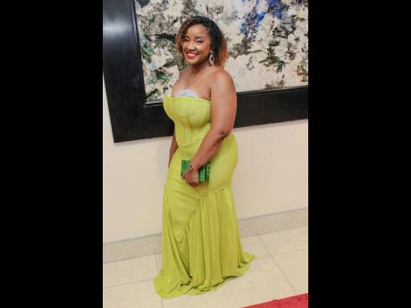 Shauna Isaacs, treasury financial controller at Supreme Ventures Limited, stunned in this lime green figure-hugging gown.