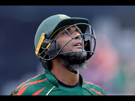 Bangladesh’s Mahmudullah Riyad reacts as he walks off the field after losing his wicket during the ICC Men’s T20 World Cup cricket match against South Africa at the Nassau County International Cricket Stadium in Westbury, New York, on June 10. Banglade