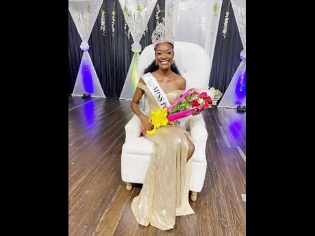Miss Portland Festival Queen Tamesha Wilson smiles brightly following her coronation last Saturday at Port Antonio High School.