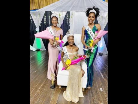 Newly crowned Miss Portland Festival Queen, Tamesha Wilson, is flanked by first runner-up, Jestina Lewis (left), and second runner-up, Nena Williams.