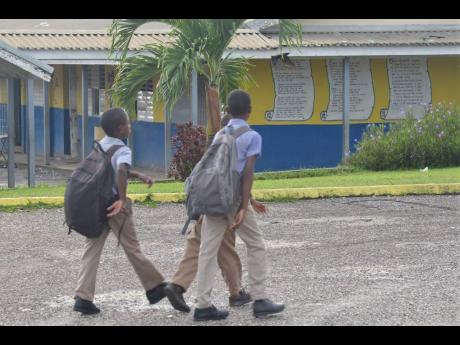 In this 2018 photo, students are seen entering Grange Hill Primary School in Westmoreland.