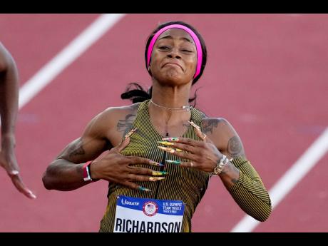 Sha’Carri Richardson celebrates her win in the women’s 100 metres at the US Track and Field Olympic Team Trials at Hayward Field in Eugene, Oregon, on Saturday.