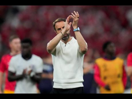 England’s manager Gareth Southgate applauds after a 1-1 tie against Denmark in a Group C Euro 2024 match in Frankfurt, Germany on Thursday.