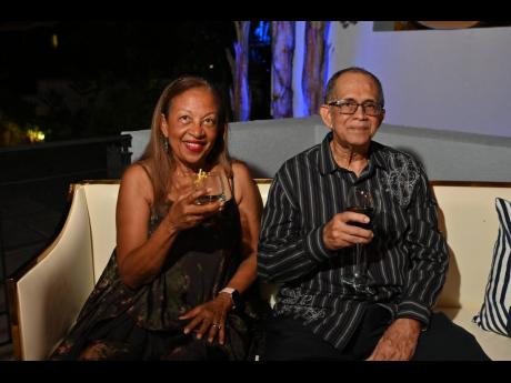 Hermine (left) and Clovis Metcalfe share a joyful moment together at the National Commercial Bank Jamaica Limited’s Legacy Soirée.