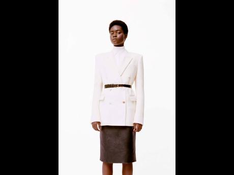 ‘Women’s Wear Daily’ reporter Miles Socha hailed the designer for blending ‘the mystical and architectural’ in his analysis of Hearst’s resort collection lookbook that features 15 visuals of Tomiwa.