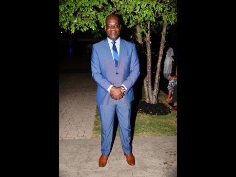 Deputy Police Commissioner Fitz Bailey is dapper in this blue suit.