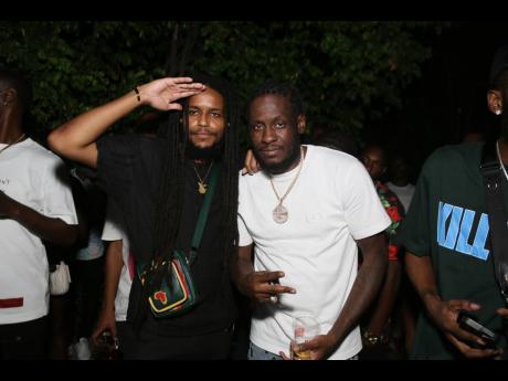 Ras-I (left) and Aidonia could not miss out on supporting another celebratory moment in dancehall. 