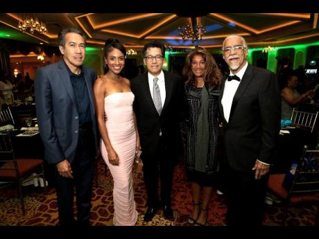 From left: Chris Chin of VP Records; singer Naomi Cowan; Randy Chin of VP Records; Kecia Chin, Randy’s wife; and People’s Ball 2023 honoree Tommy Cowan.