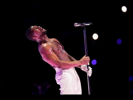 Usher performs during halftime of the NFL Super Bowl 58 football game on February 11.