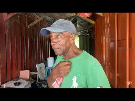 Robert Williamson said he would be rather be with his colleagues at the fishing village than in the comfort of his home as the Category 4 system passed the island.