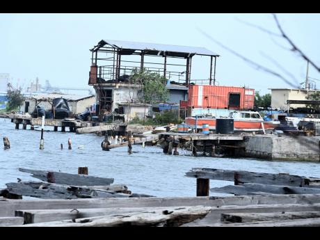 Rudolph Brown/Photogapher 
A damaged building at the Fisheries Division is seen on the waterfront in downtown Kingston,  on Thursday, July 4, 2024, a day after the passage of Hurricane Beryl.