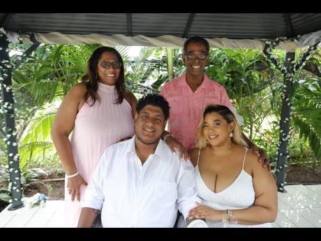 Left: On their special day, the bride and groom were supported by the bride’s parents Yasmin (left) and Errol Russell.