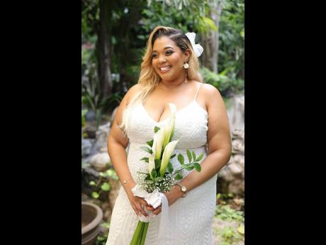 BELOW: The gorgeous bride, Trishana Russell-Moss, smiled brightly, radiating joy on her big day.