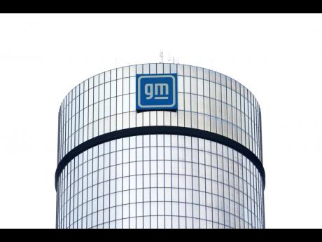 A General Motors logo is seen on a building on April 24, 2024 in Detroit.