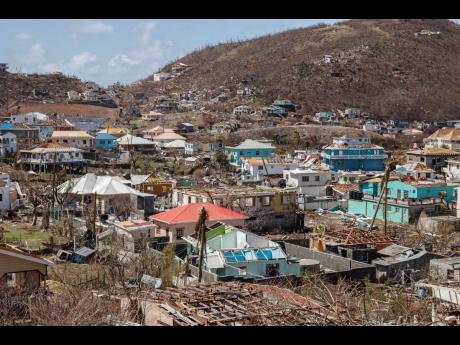 Homes destroyed by Hurricane Beryl lie in Clifton, Union Island, St Vincent and the Grenadines, Thursday, July 4, 2024.