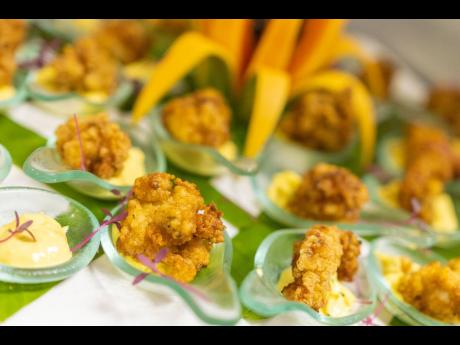 Cajun fried octopus, with mango pepper pot dip. 