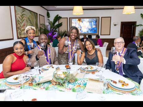 From left: Judene Buchanan, Dame Michelle Gordon, Chavalier Dwight Powell,  Dame Charmaine Deane, Cherine Robinson, and Chavalier Frank Ventura.