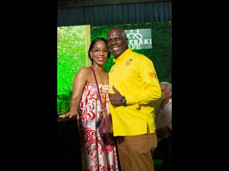 Simone Clarke (left), popular host and media personality and Norman Grant, chief executive officer, Jablum Coffee House, paused for a photo op.