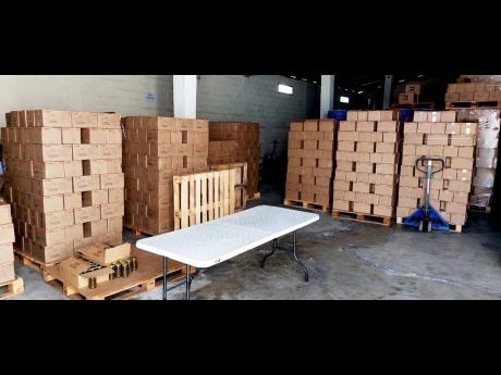 Boxes of pepper packaged by Gray’s Pepper Products line the company’s storeroom in Westmoreland.