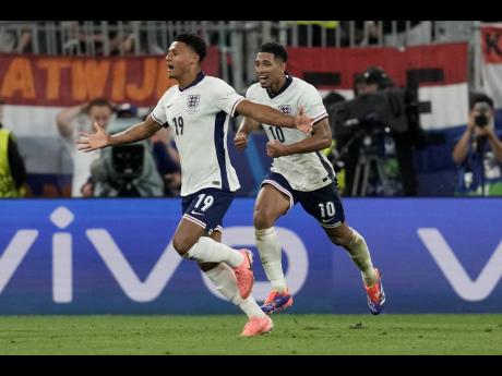 England’s Ollie Watkins celebrates after scoring his side’s second goal against Netherlands during a semi-final at the Euro 2024 football tournament in Dortmund, Germany, yesterday.