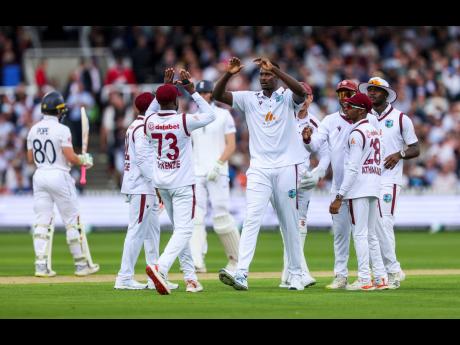 West Indies’ Jason Holder celebrates a wicket that is not given after review on day one of the first Rothesay Men’s Test match at Lord’s Cricket Ground, London, Wednesday, July 10.