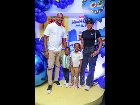 Asafa Powell (left) and wife, Alyshia Miller-Powell (right), and their little ones –  Azhaf and Amieke.