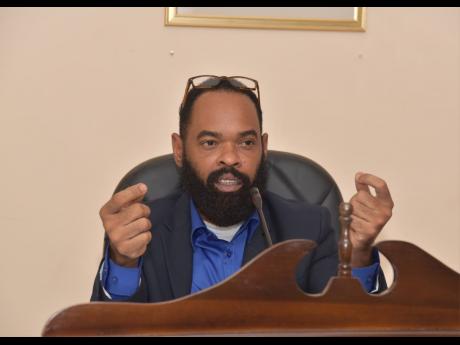 Black River Mayor Richard Solomon addressing Thursday’s St Elizabeth Municipal Corporation meeting in Black River.