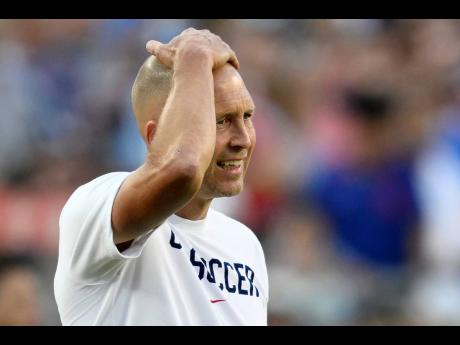 United States coach Gregg Berhalter reacts during the first half of a Copa America Group C football match against Uruguay on Monday, July 1 in Kansas City, Missouri.