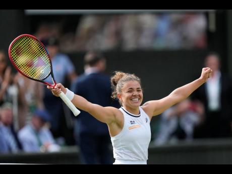 Jasmine Paolini of Italy celebrates after defeating Donna Vekic of Croatia in their semifinal match at the Wimbledon tennis championships in London yesterday.