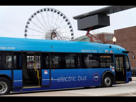 A Chicago Transit Authority electric bus charges at Navy Pier on February 14, 2023, in Chicago.