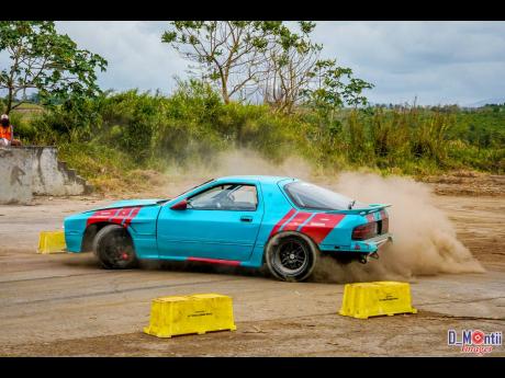 
Despite mechanical  gremlins competing with him all day, Nigel Wilmot was still able to take third place in the Rear-wheel Drive with Limited Slip Differentials Class in his Mazda Rx7.