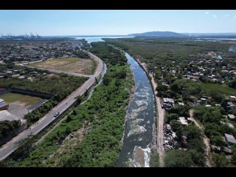 
An aerial view of a section of Sandy Gully between Seaview Gardens and Riverton City.