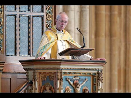 The Archbishop of Canterbury Justin Welby leads the Easter Sung Eucharist at Canterbury Cathedral in Kent, England, Sunday April 17, 2022. 