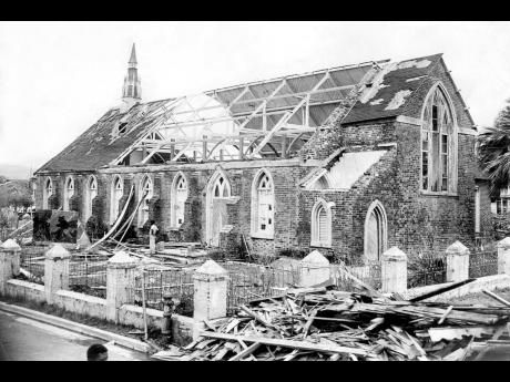 
This 1951 photo shows Wesleyan Church in Morant Bay which lost its roof after Hurricane Charlie hit Jamaica.