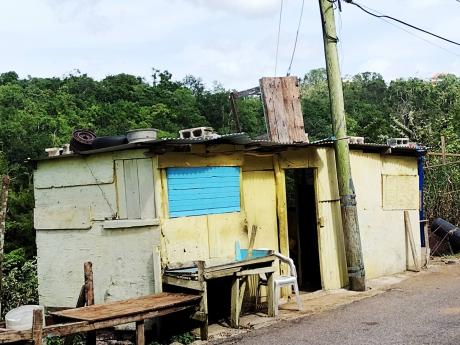 
Cement blocks and other items used to reinforce Phillip Haughton’s shop roof in Biddiford, Trelawny. 