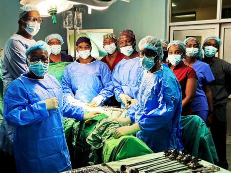 The dedicated team of surgeons, nurses and anaesthesiologists performing the first laparoscopic colon surgery, led by Dr O’Rane
Thomas.