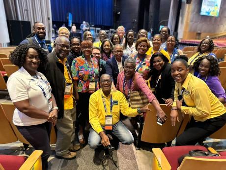 Hope Markes in the middle of the Caribbean group after she was elected vice-president of Kiwanis International on July 6 in Denver, Colorado, in the United States.