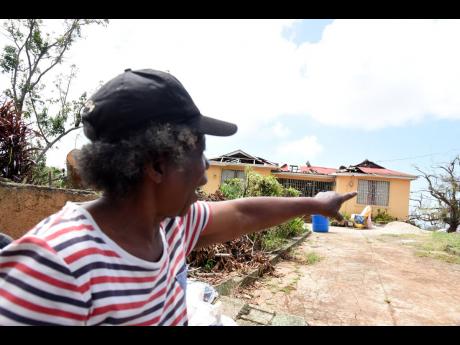 Darnett Bent recalls the traumatic events as she and her family had to flee from her ravaged home to shelter nearby during the passage of Hurricane Beryl.