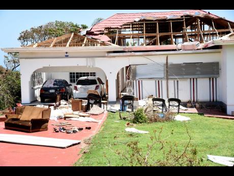 
One of the many houses in St Elizabeth, whose roofs was severely damaged during the passage of Hurricane Beryl.