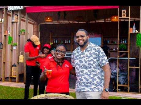 Trade Marketing Manager at Moneymusk Rums, Kaydeon Thomas (left) and Communications Manager at the Campari Group, Dominic Bell (right) celebrate another successful year of the Appleton Estate Jamaica Rum Festival.